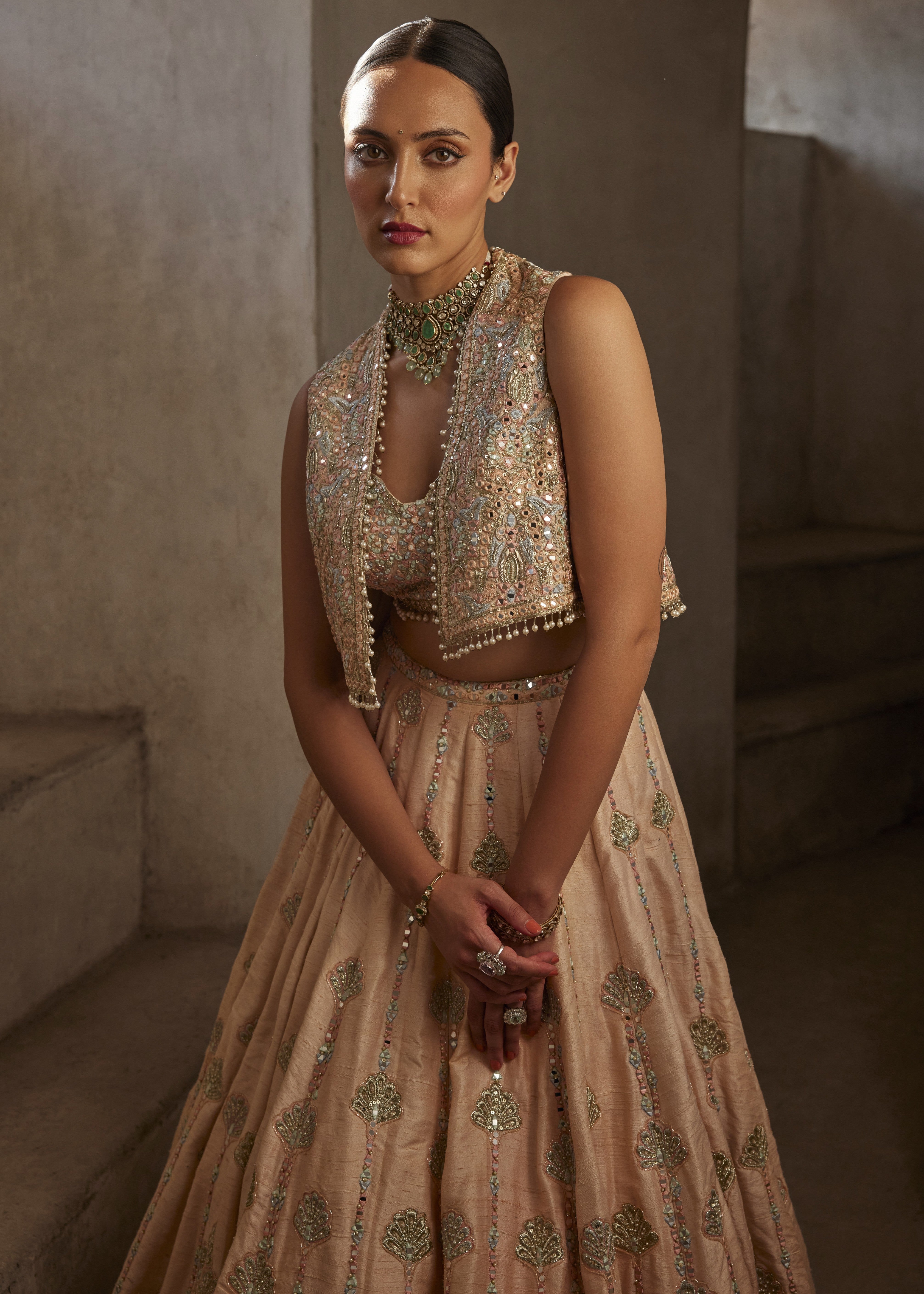 Peach Lehenga with Short Jacket and Bustier