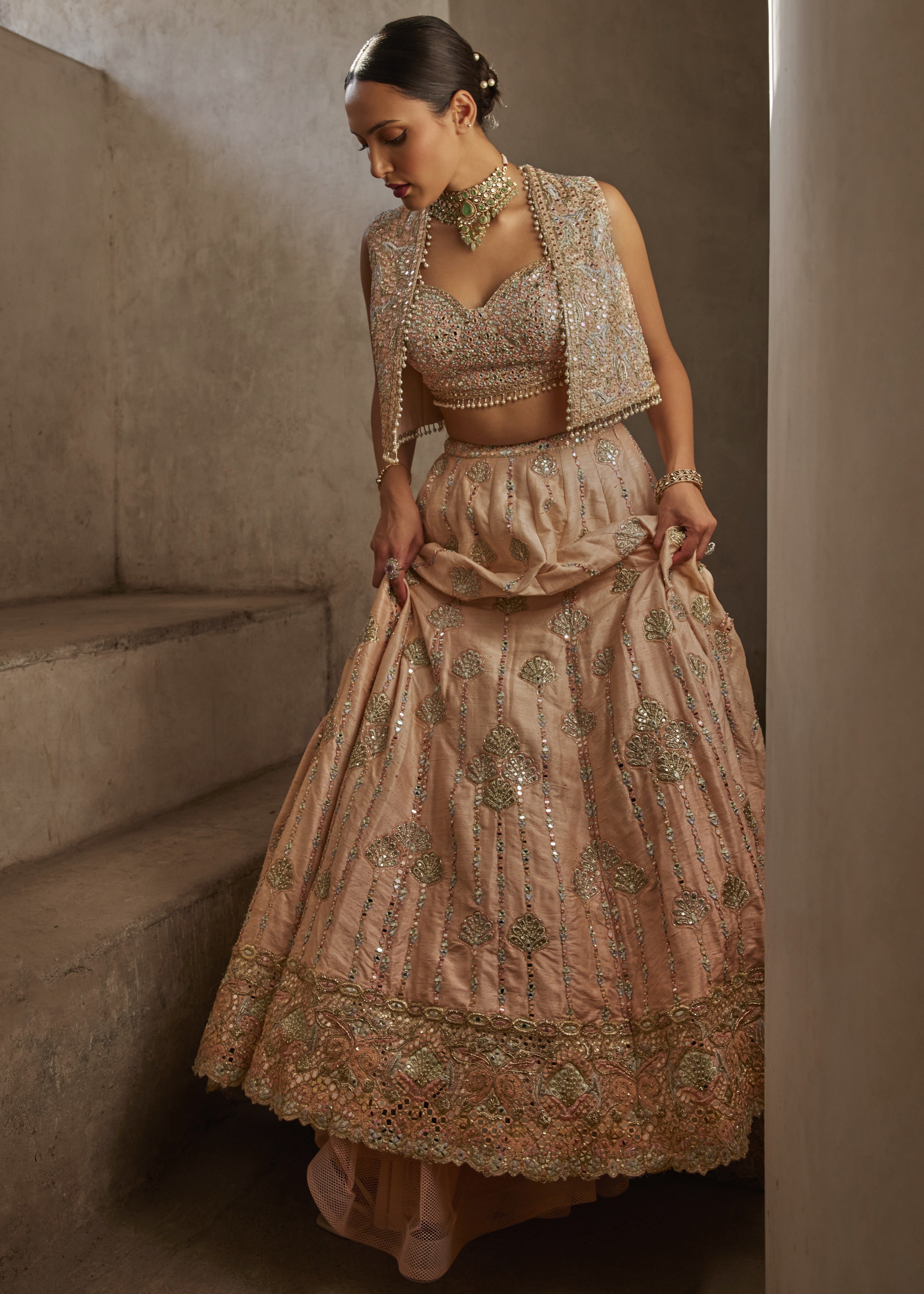 Peach Lehenga with Short Jacket and Bustier