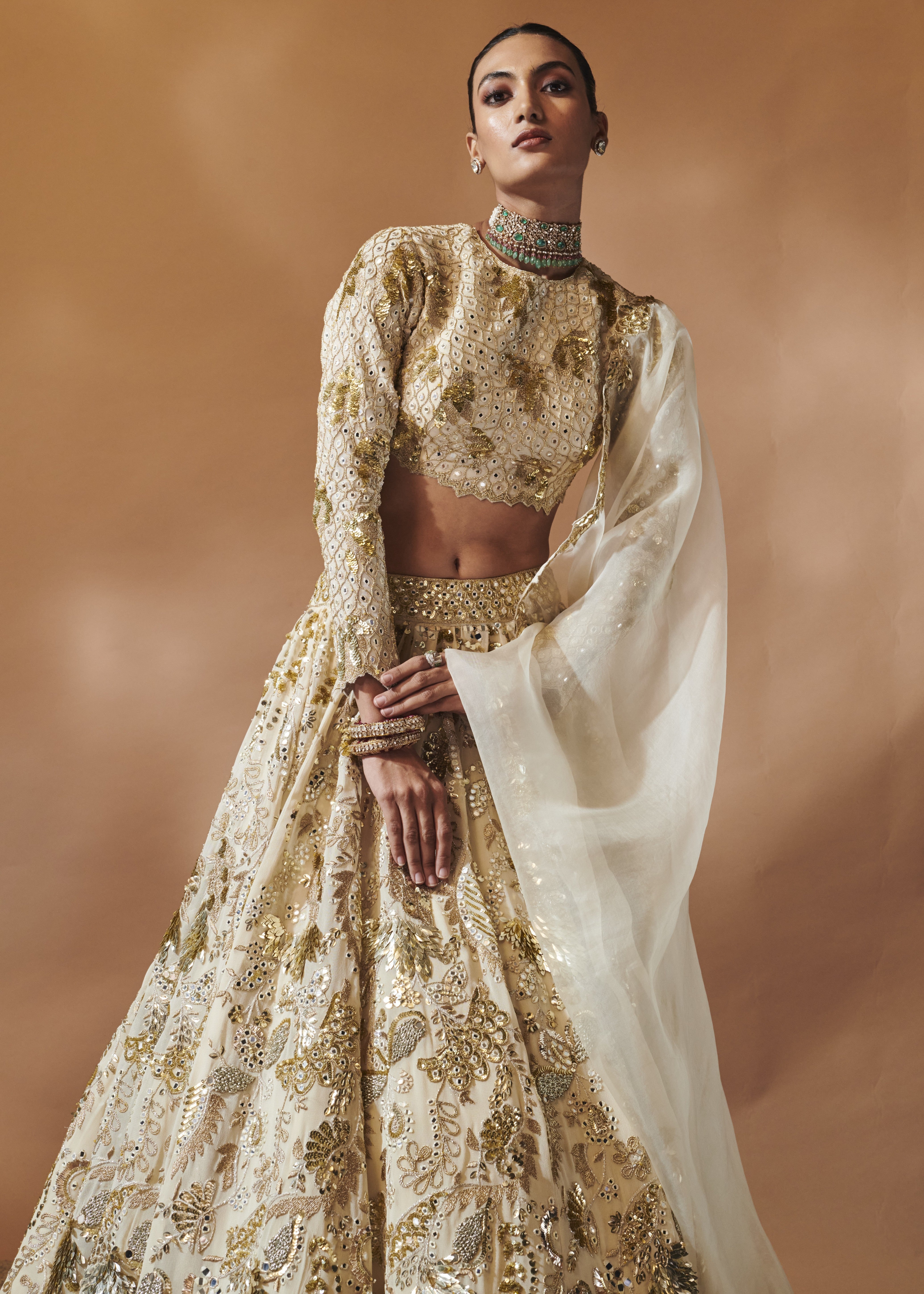 Ivory and Gold Heavily Embroidered Lehenga Set
