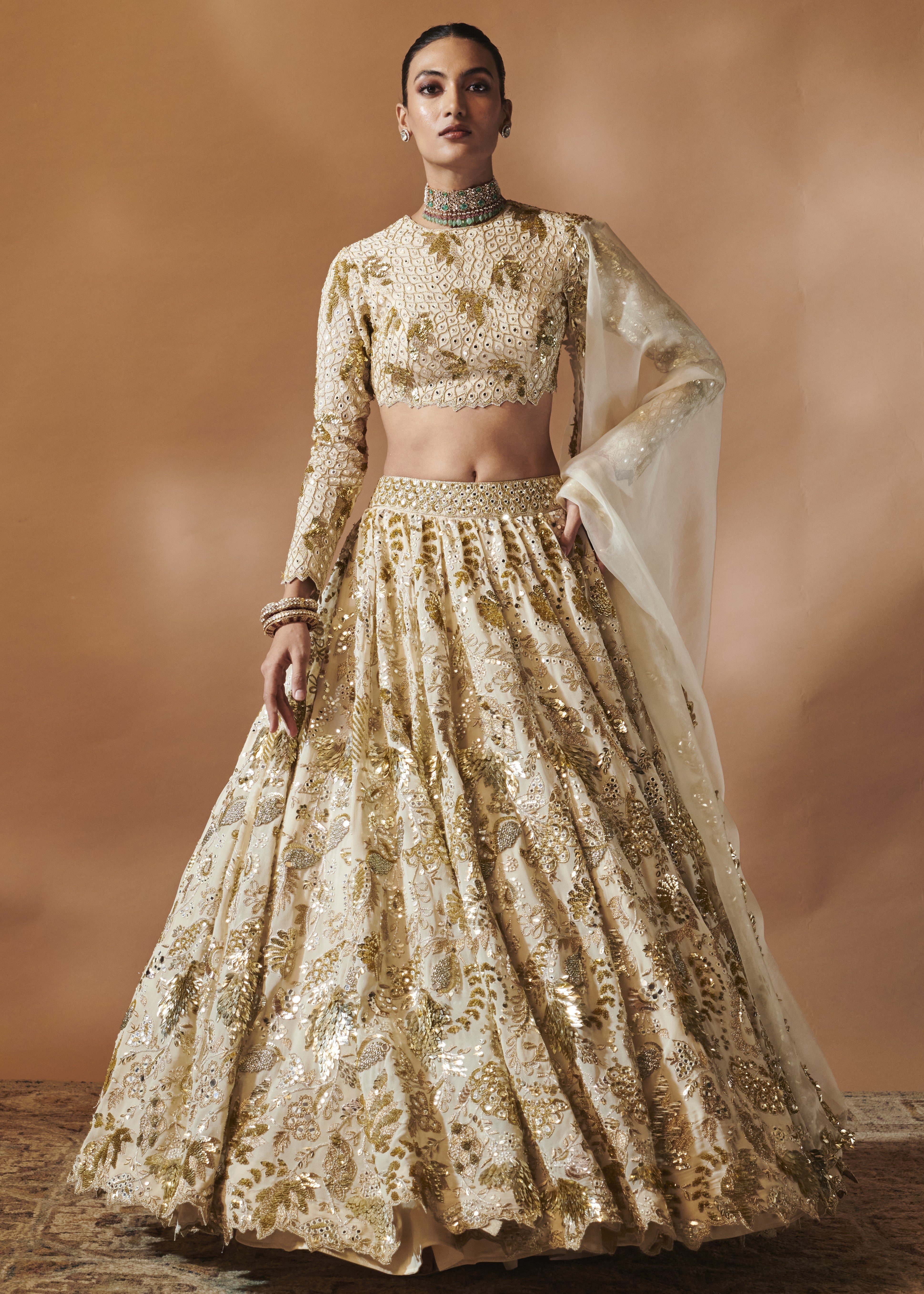 Ivory and Gold Heavily Embroidered Lehenga Set