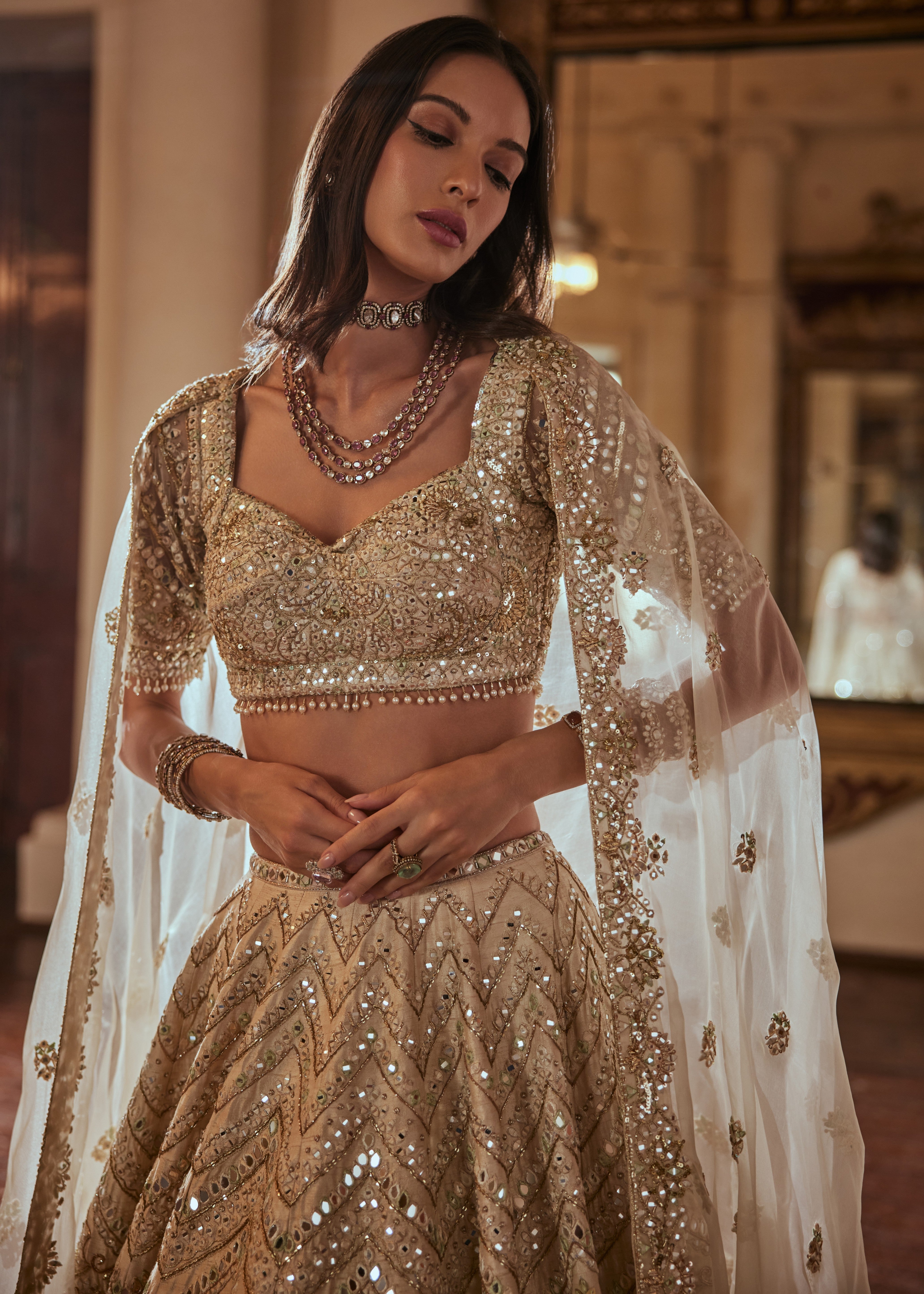 Cream Lehenga with Green Highlighting