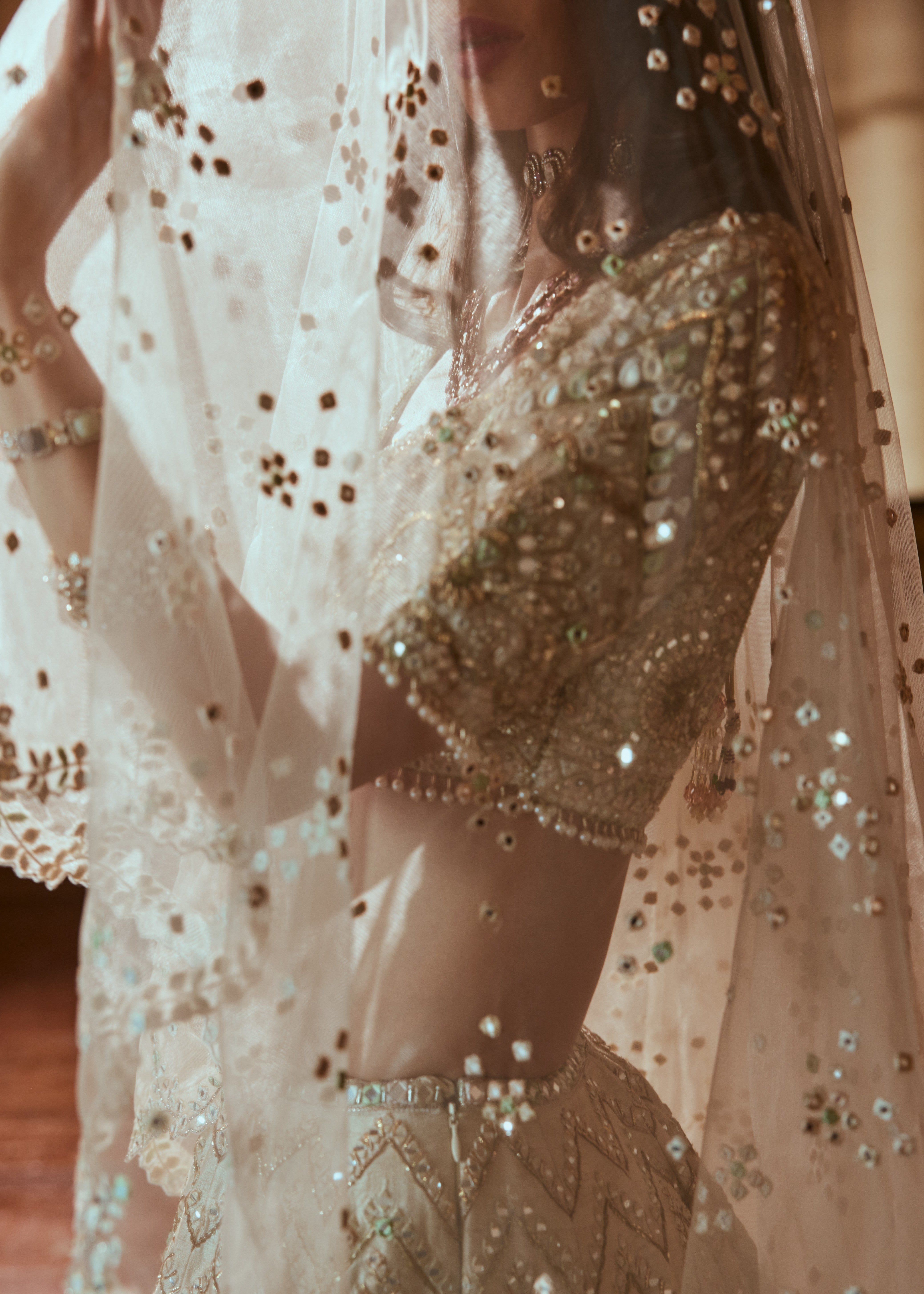 Cream Lehenga with Green Highlighting