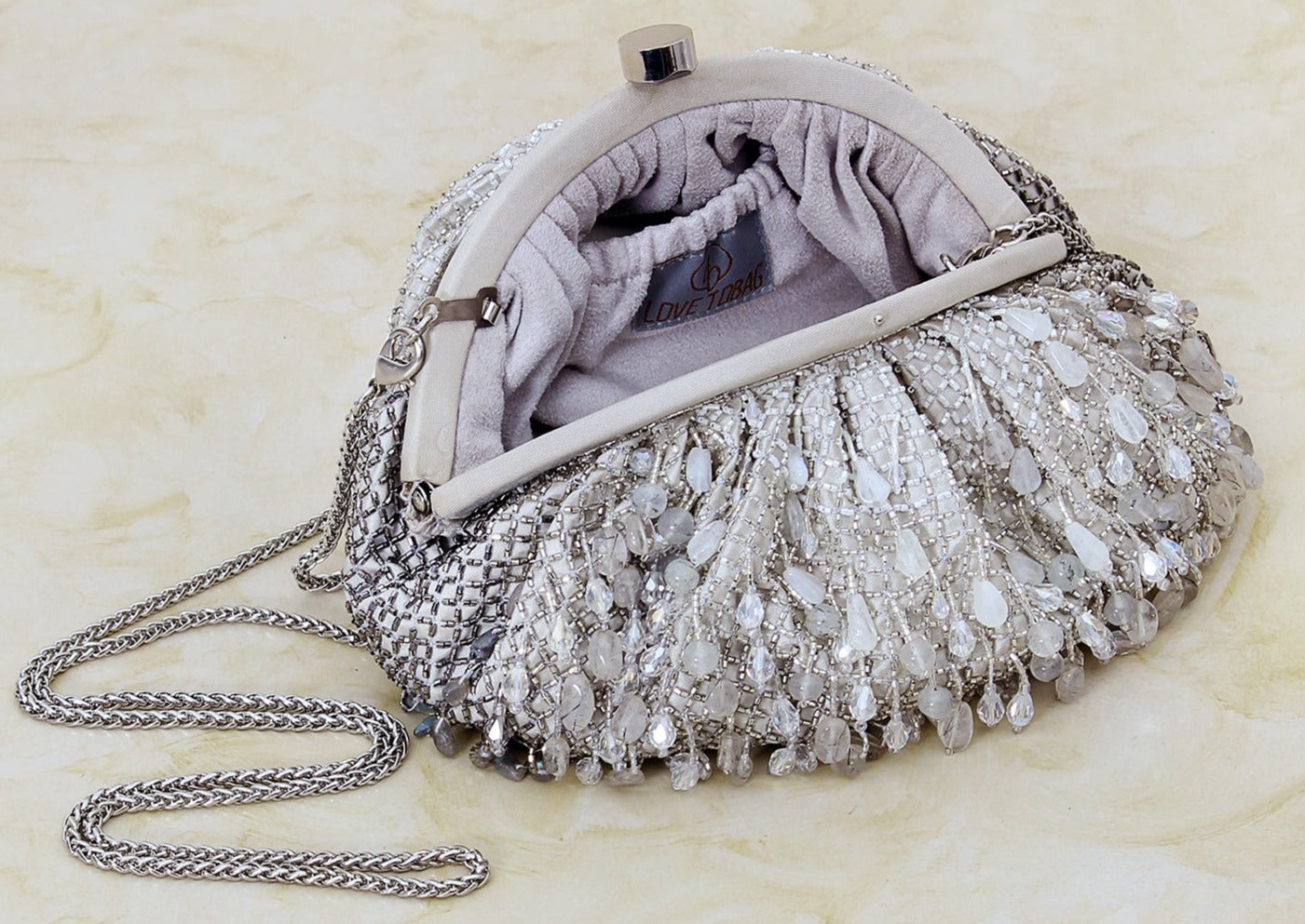 Opal Soft Pouch Lustrous Silver Clutch
