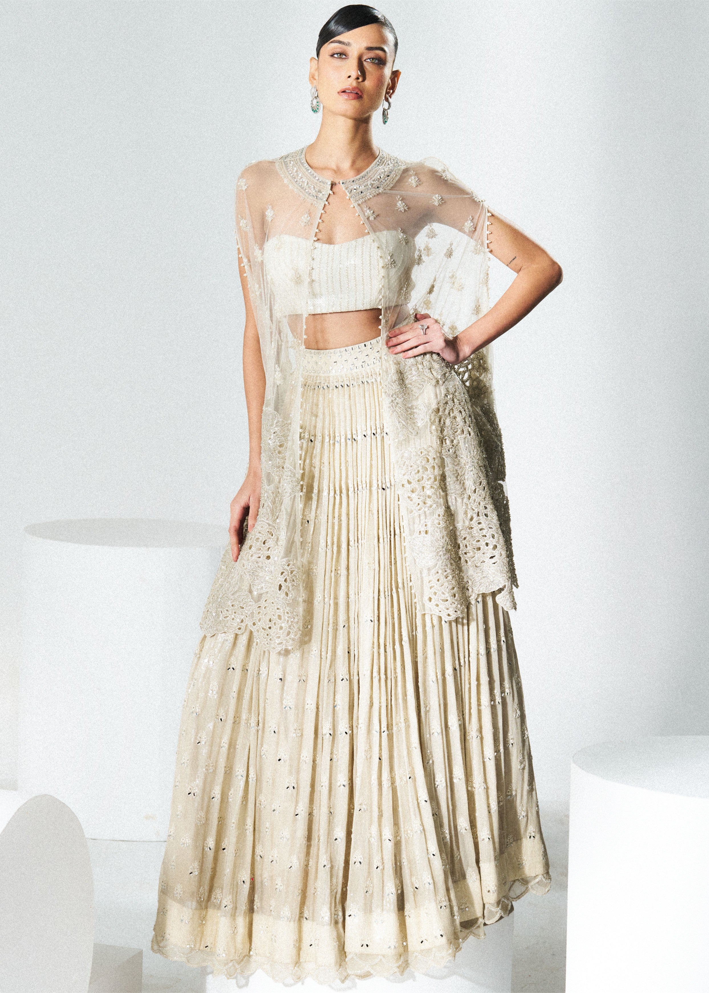 Beige Sequins Mirror Work Lehenga With Cape