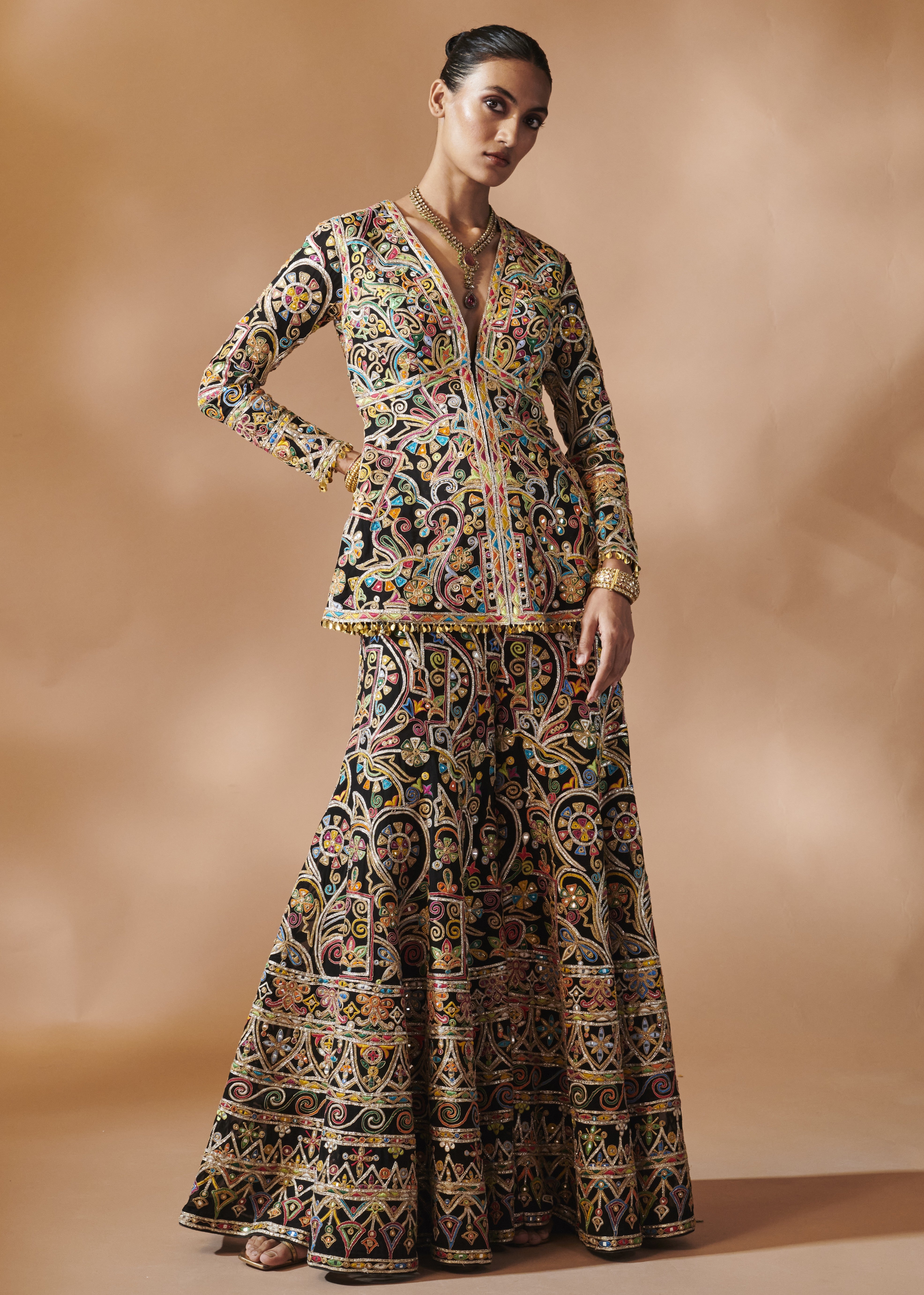Black Sharara With A Peplum Kurta