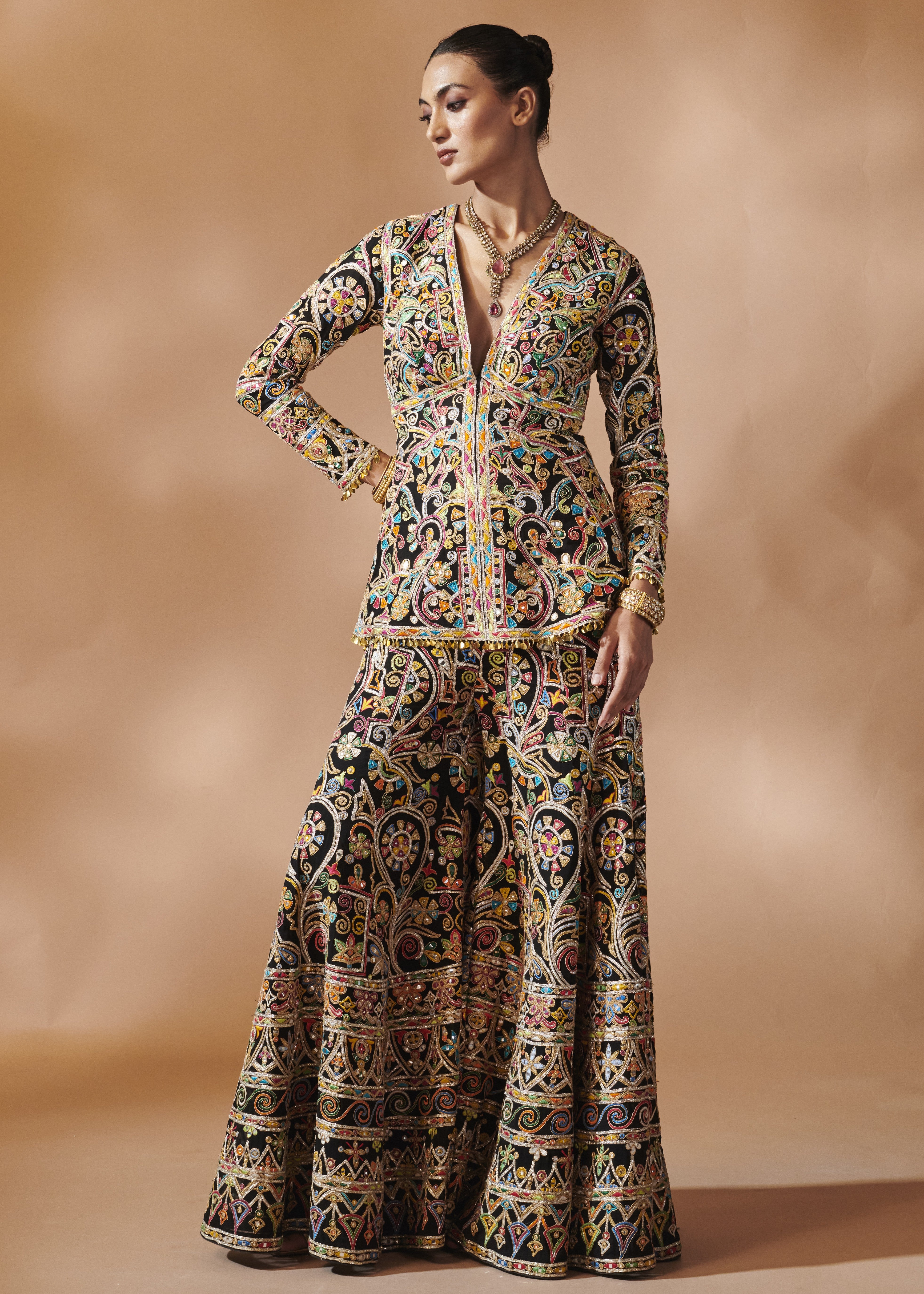 Black Sharara With A Peplum Kurta