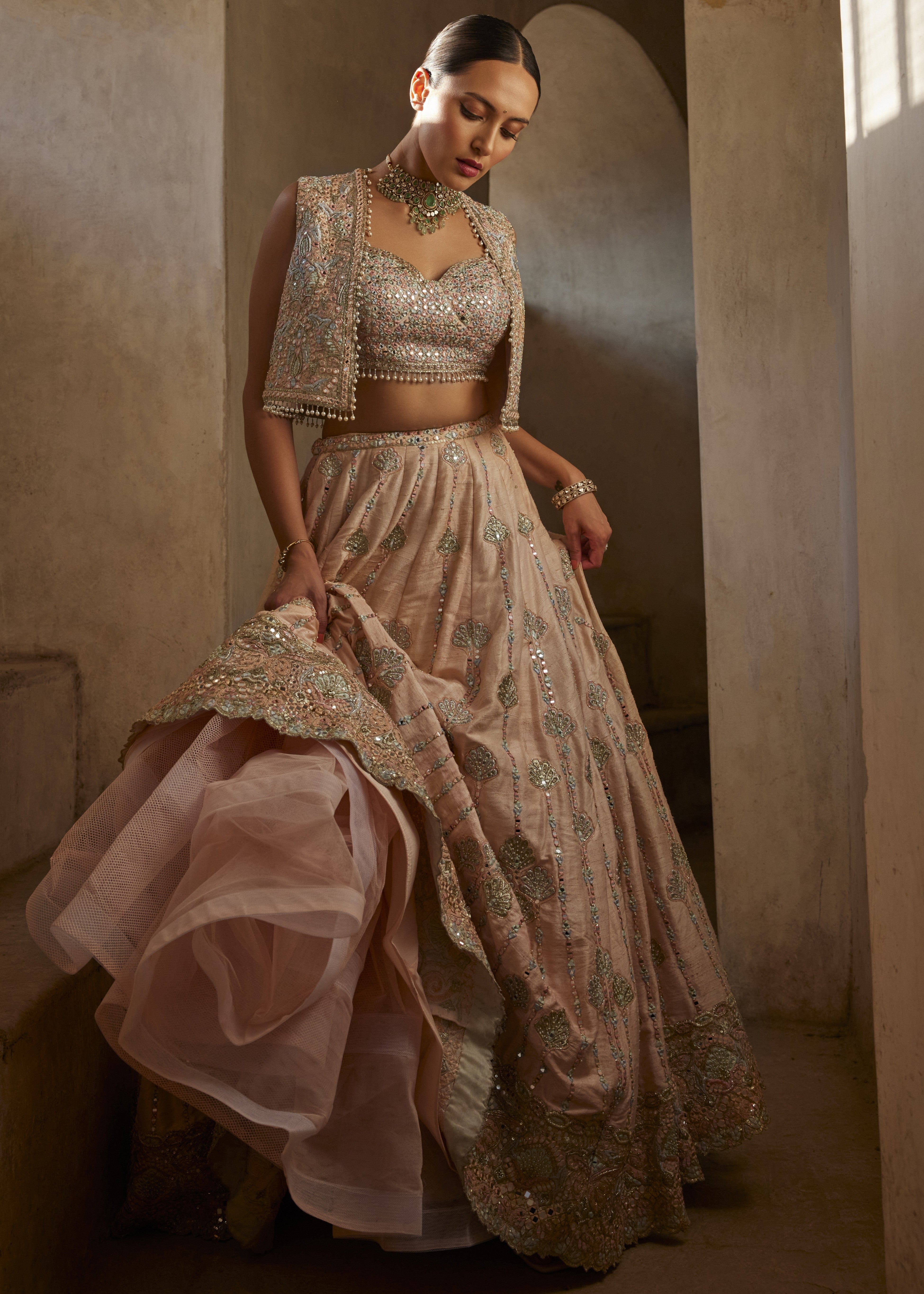 Peach Lehenga with Short Jacket and Bustier