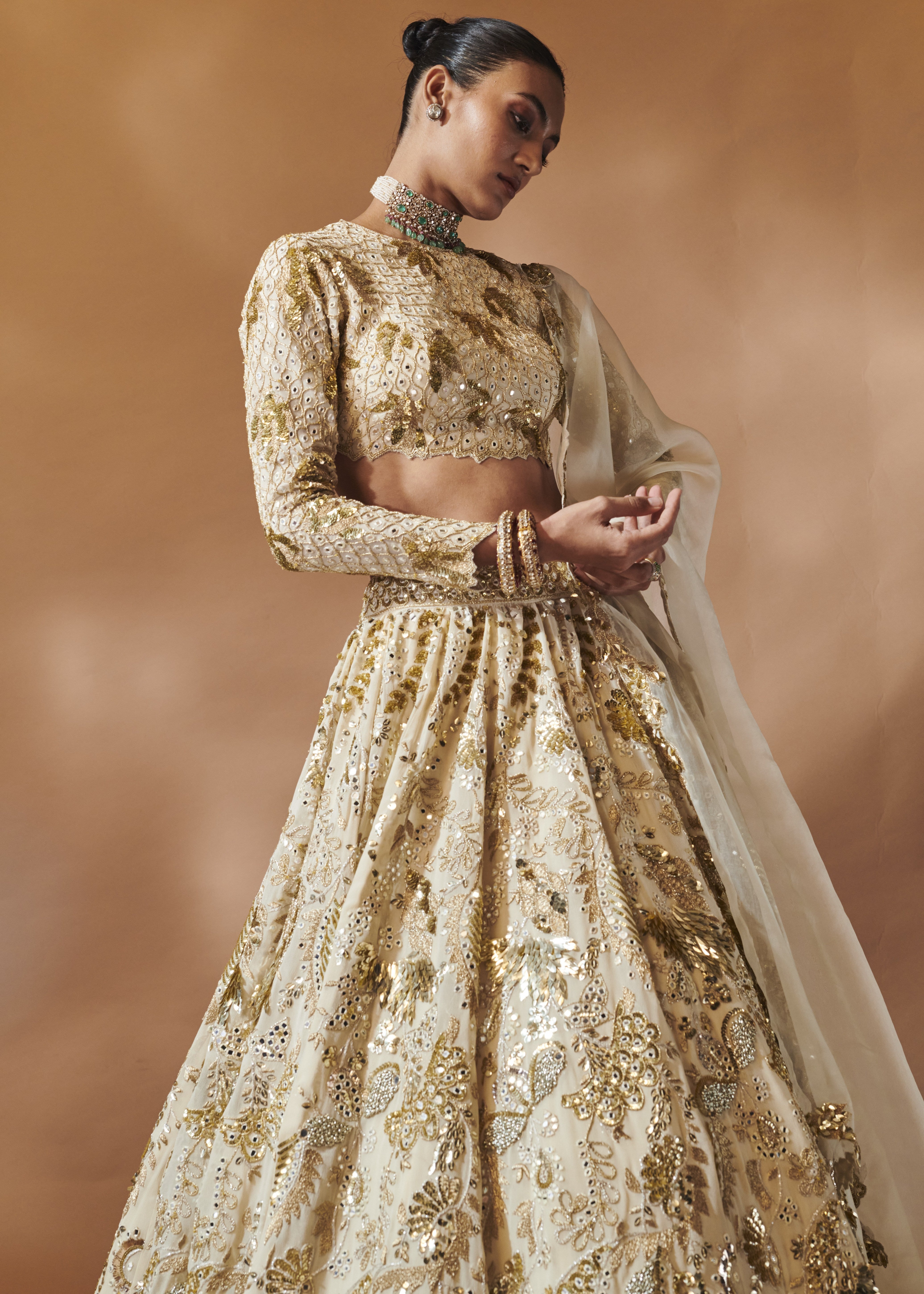 Ivory and Gold Heavily Embroidered Lehenga Set