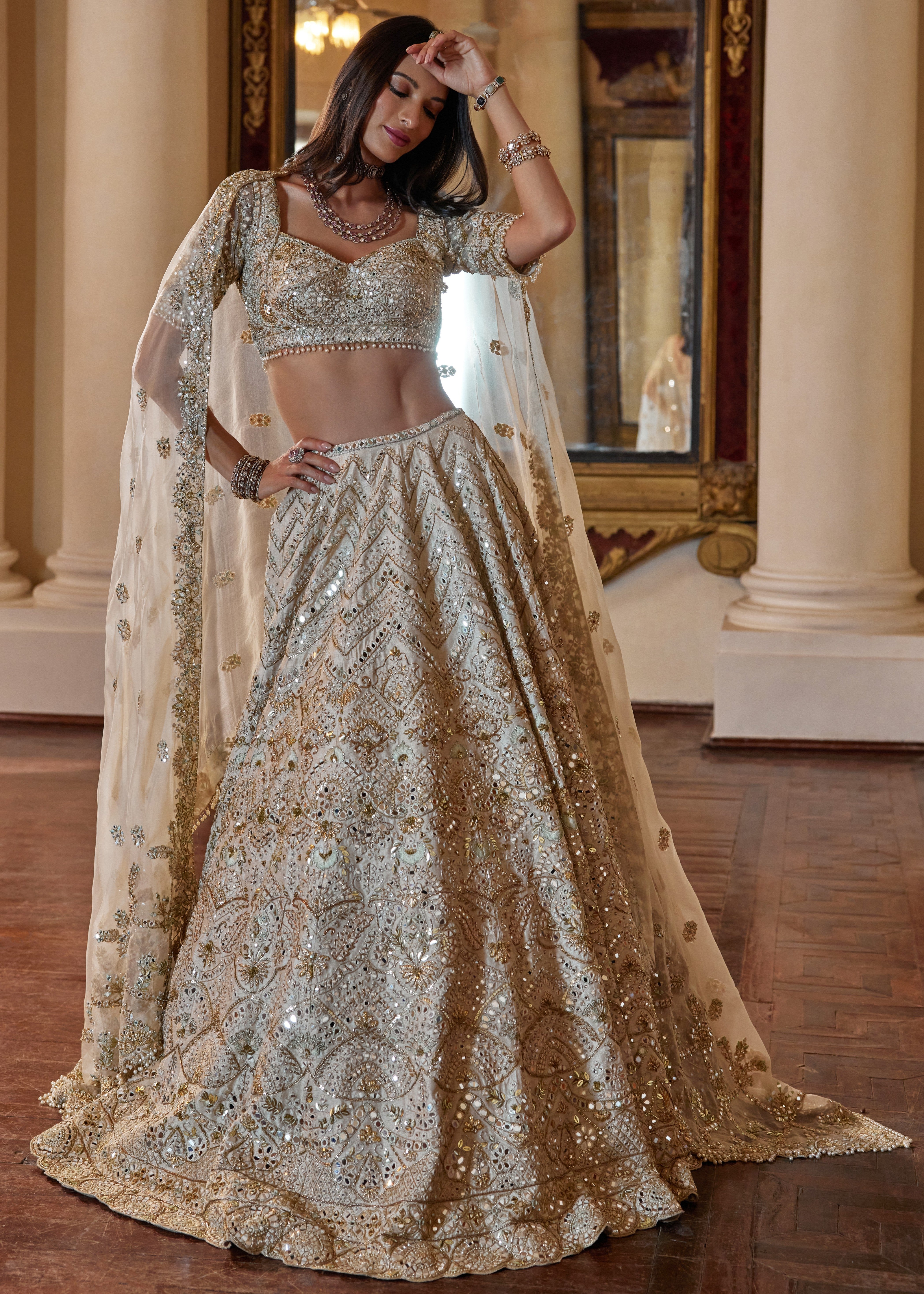 Cream Lehenga with Green Highlighting